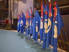 Sotaveteraanipiirien liput liittojuhlassa Joensuussa