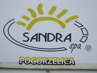 Puolalaisen kylpylä Sandra Spa:n tunnus