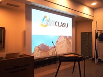 Clasun 120-vuotislogo ja koulun päätykuva